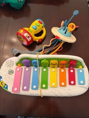 Leap frog keyboard, Vtech flashlight, and sensory toy